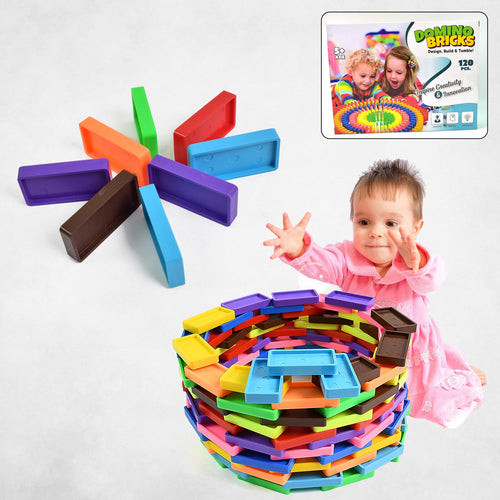 Children arranging colorful wooden domino blocks for a chain reaction game.