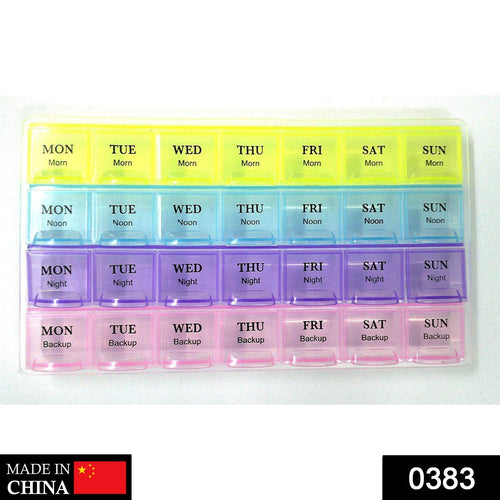 Top view of a compact 28-slot weekly pill organizer with clear daily compartments.