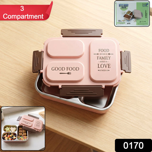 Opened 3-compartment stainless steel lunch box containing fresh separate meals